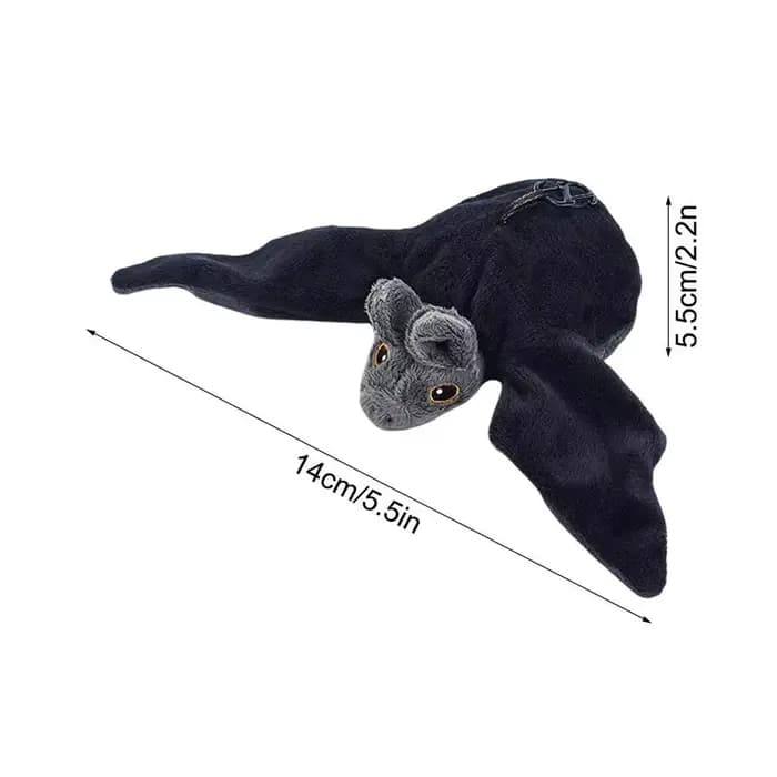Oiseau volant battant avec herbe-aux-chats