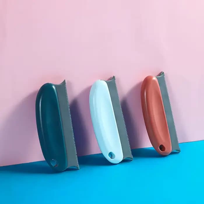 Brosse de nettoyage des poils d'animaux