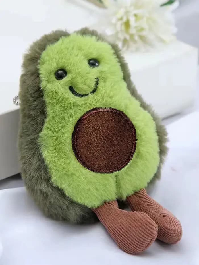 Un joli jouet en peluche avocat pour animaux de compagnie, adapté à la compagnie quotidienne des chi