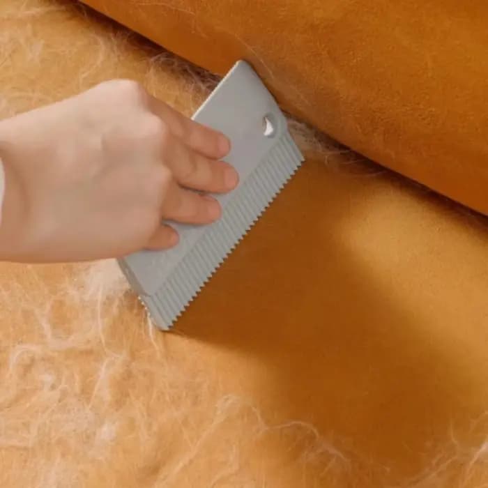 Brosse de nettoyage pour poils d'animaux