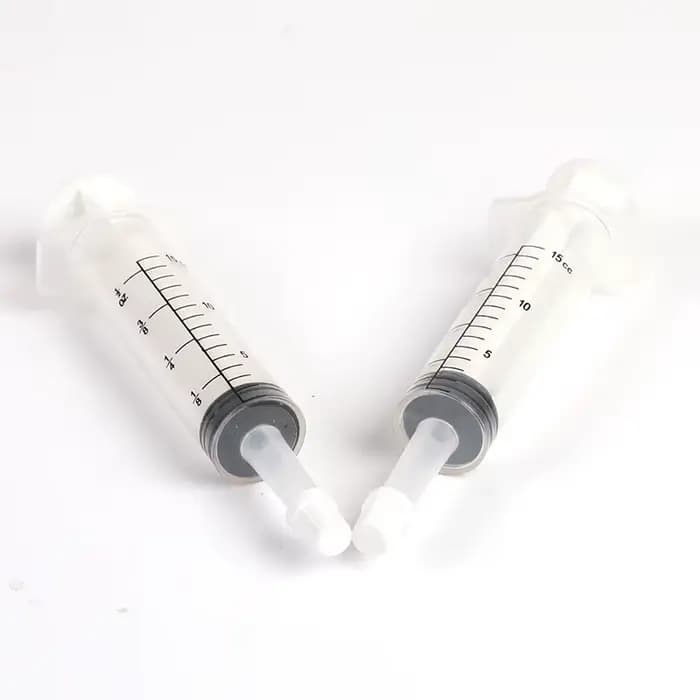 Distributeur de médicaments à Tube poussoir pour animaux de compagnie