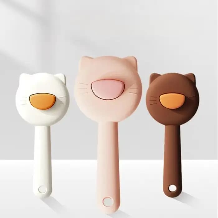 Brosse pour enlever les poils de chat