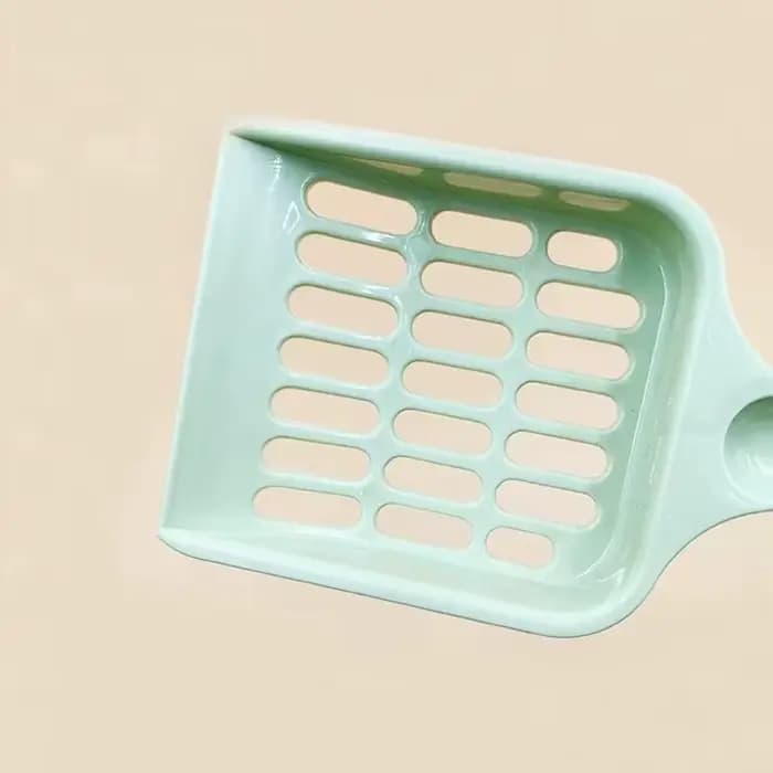 Nouvelle pelle à litière pour chat à grille simple à la mode